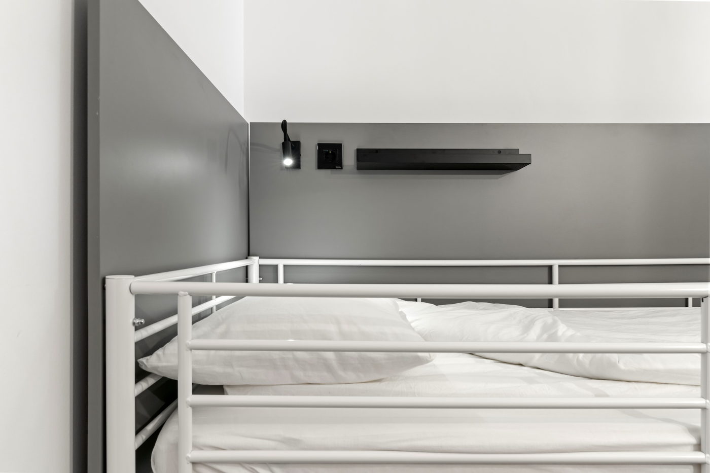 Every bunk has a reading light, socket and shelf