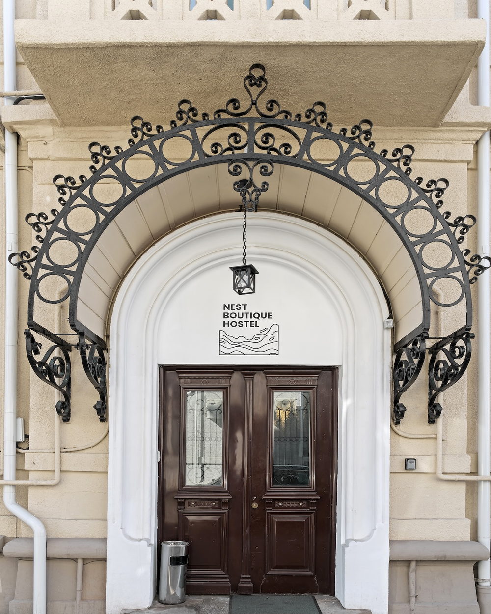 The entrance to Nest Boutique Hostel on Bulevardul Regina Maria
